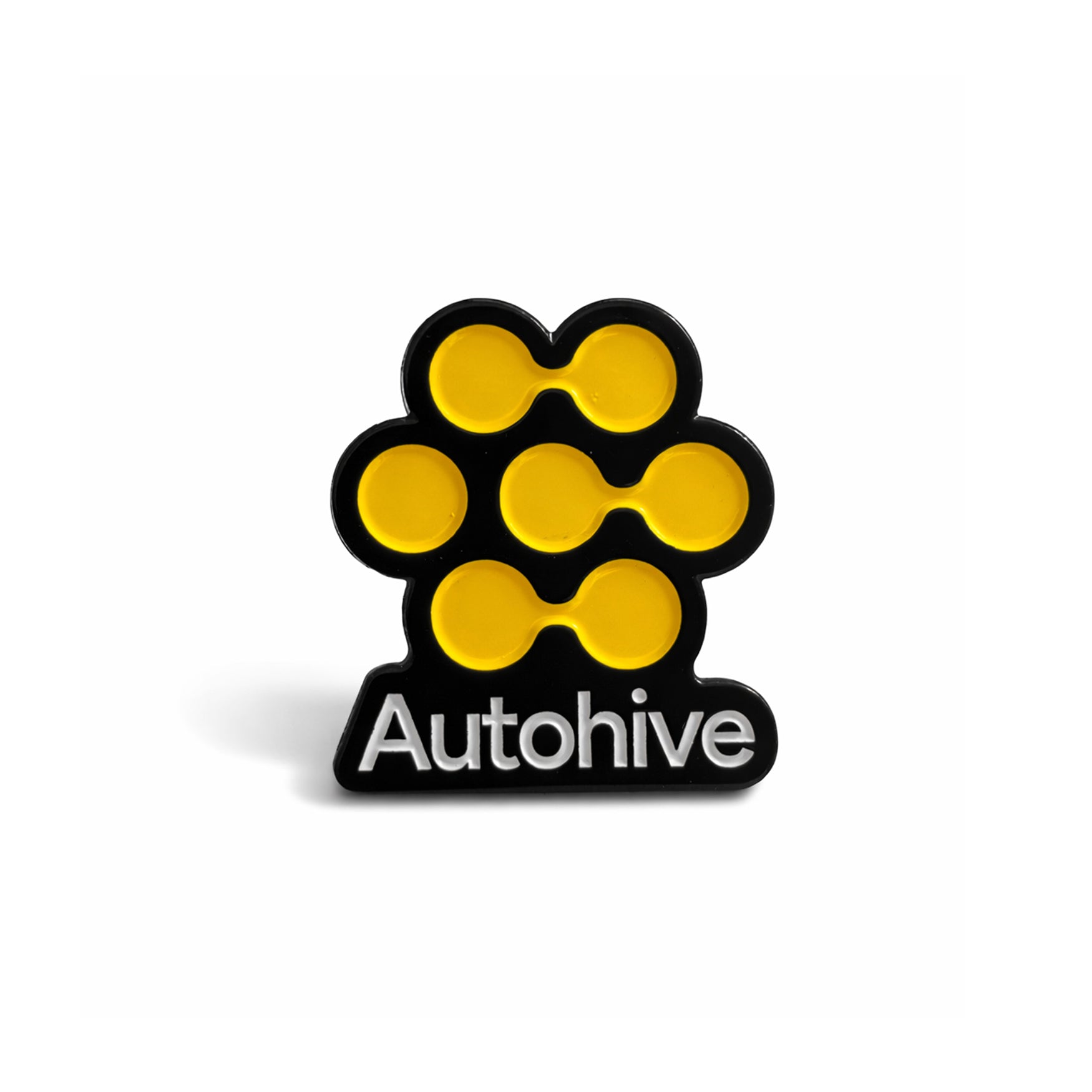 Yellow and black enamel pin