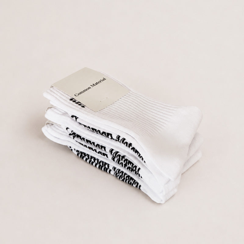 stack of white socks folded