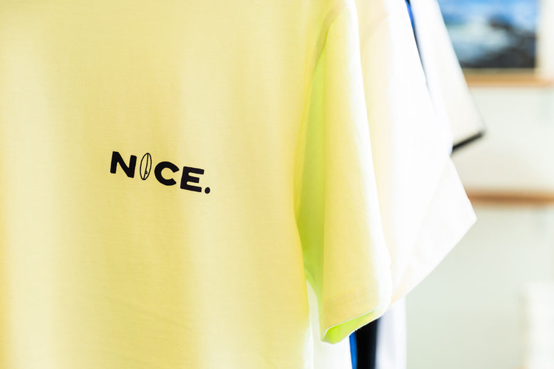 green shirt with black screen print